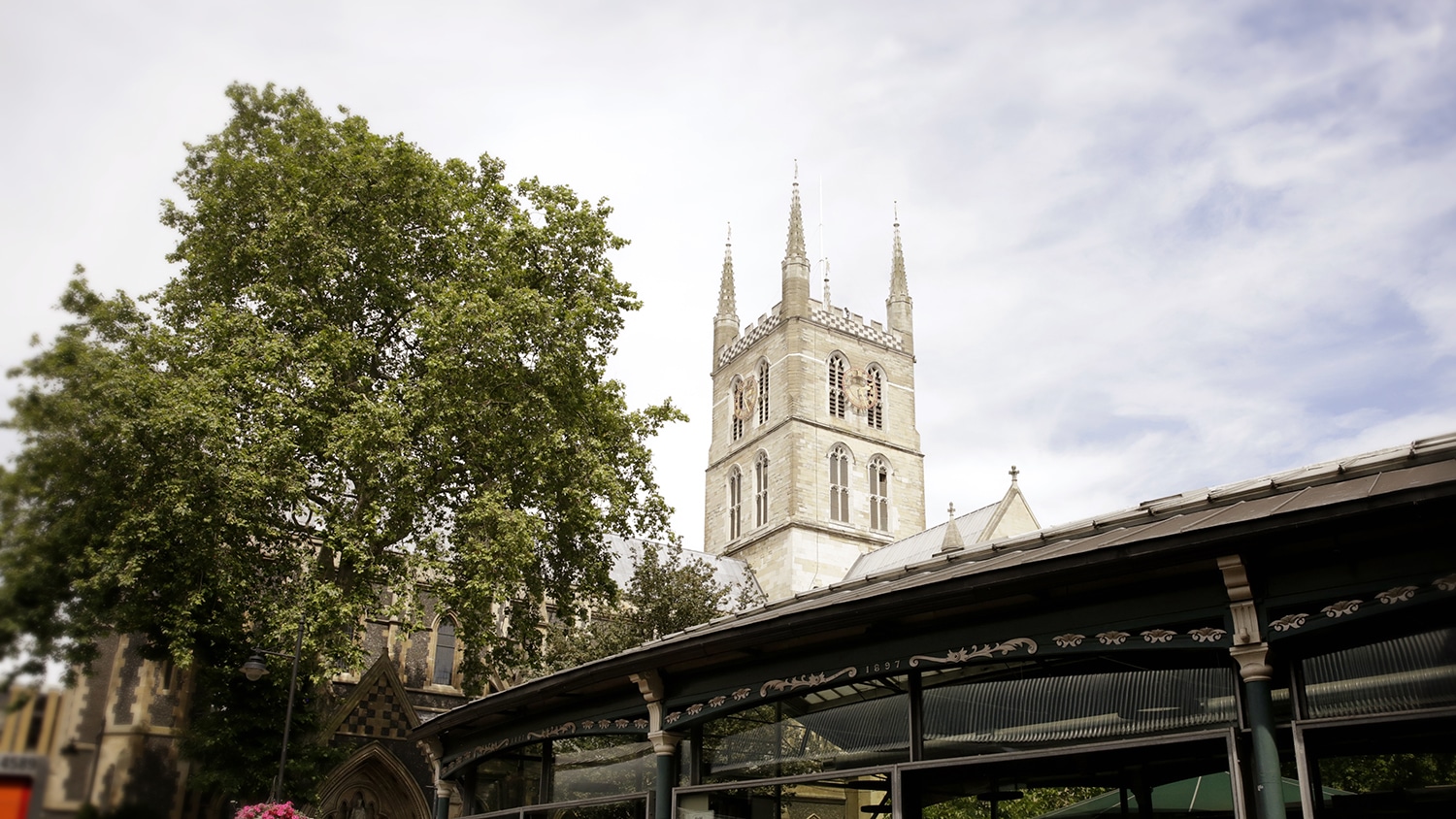 Southwark Cathedral in the background of Borough Market