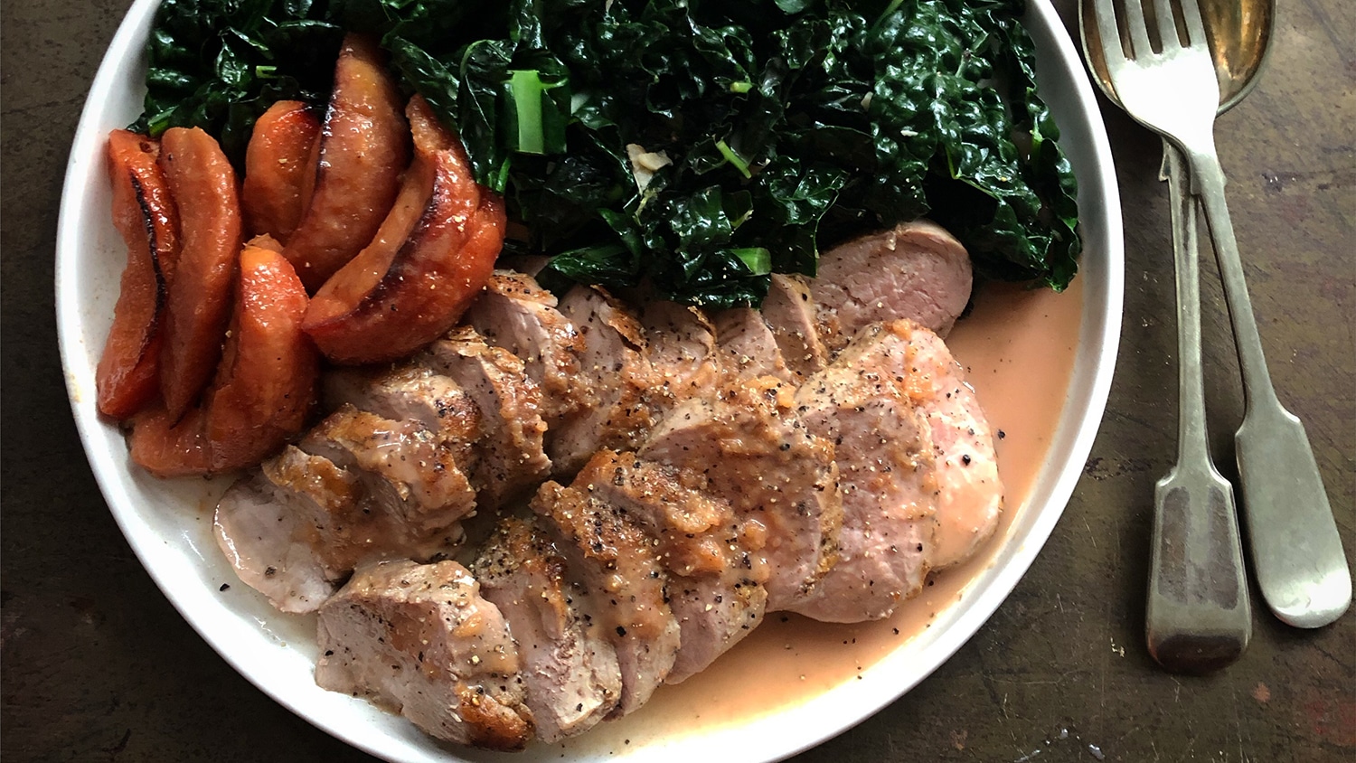 Pork tenderloin with roast quince & winter greens Borough Market
