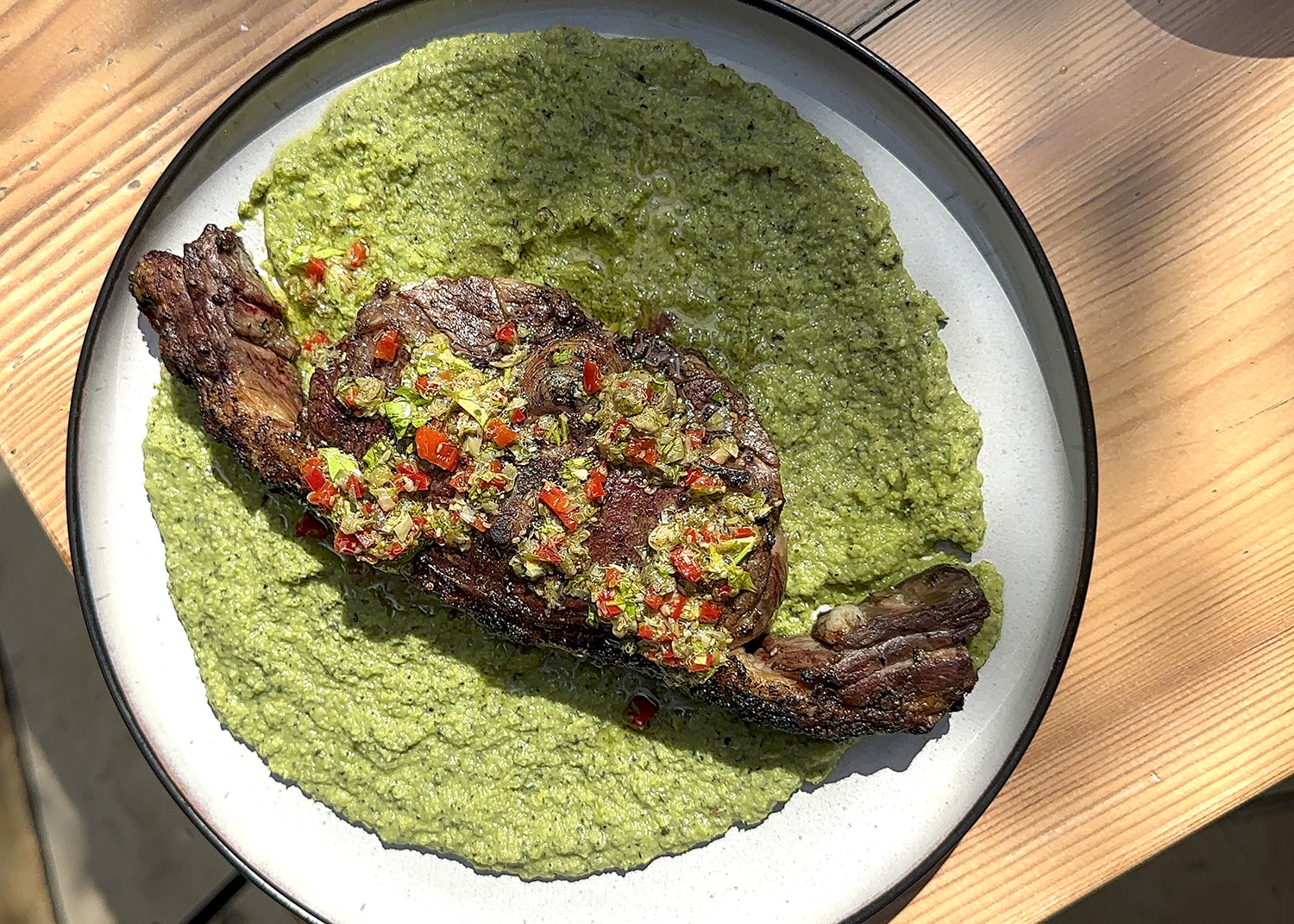 Grilled Barnsley lamb chop with pea & mint puree, made with Borough market ingredients