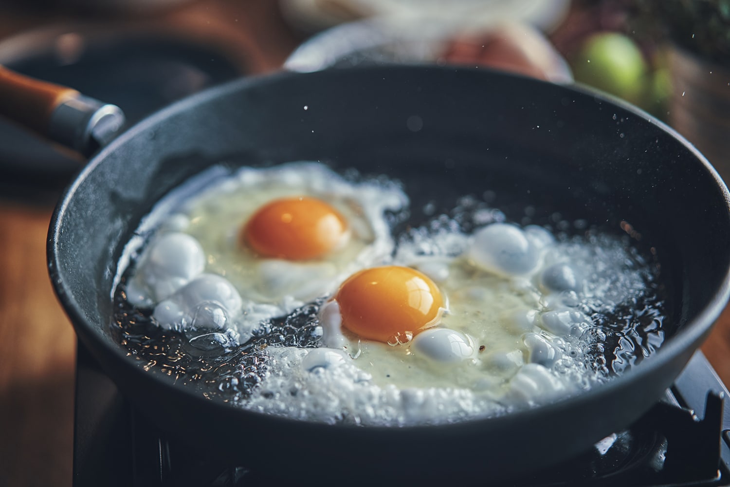 Eggs frying in a pan