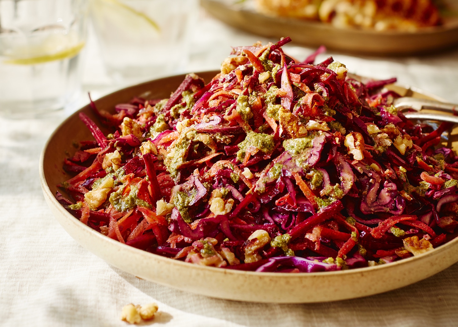 Beetroot, red cabbage & carrot slaw with walnut & herb dressing