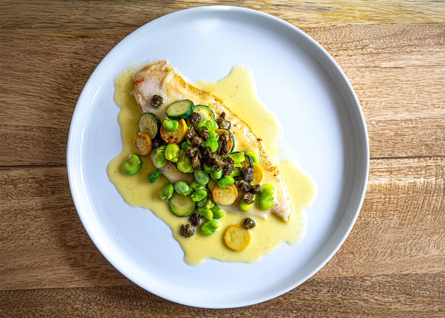 Lemon sole, summer vegetables & chicken butter sauce