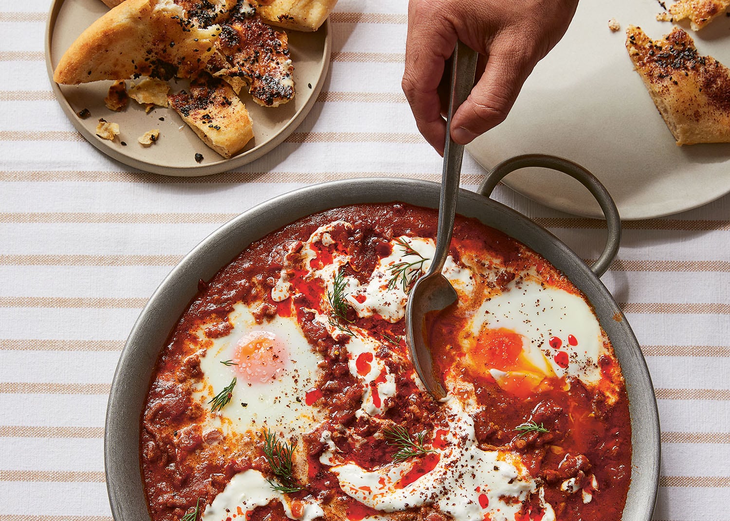 Harissa keema shakshuka with naan soldiers